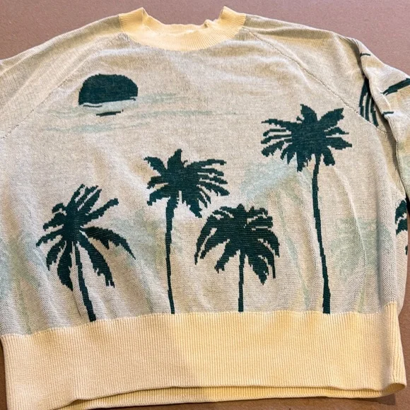 THE GREAT. Striped Knit Sweater in Cream and Green - Picture 1 of 5